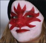 Face Painting of Canadian Flag At Festival